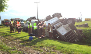 Overturned frac sand trucks in Carroll County, OH May, 2014 (Courtesy of Carol McIntire, The Free Press Standard)