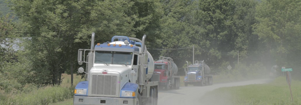 Caravan of trucks. Photo by Savanna Lenker, 2014.