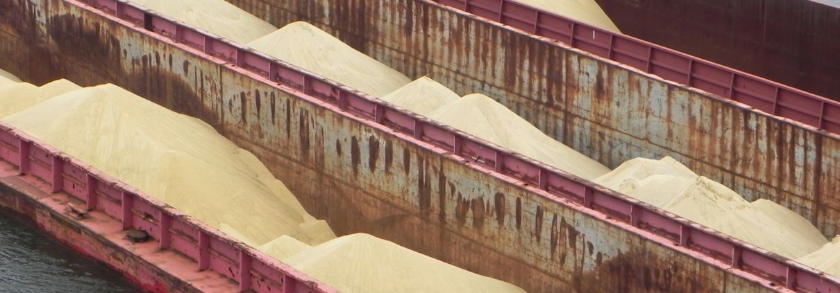 Frac sand being transported by barge in Iowa