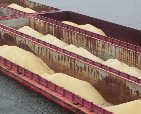 Frac sand being transported by barge in Iowa