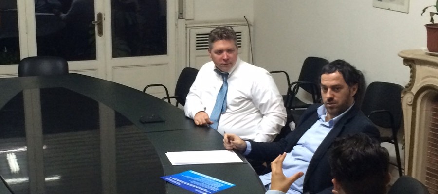 Matthew Kelso and colleagues during discussions before a Senate meeting in Argentina