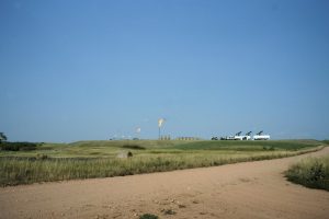 A multi-well pad with a natural gas collection tanks. Located near Keene, North Dakota. Photo by David Nix 2015.