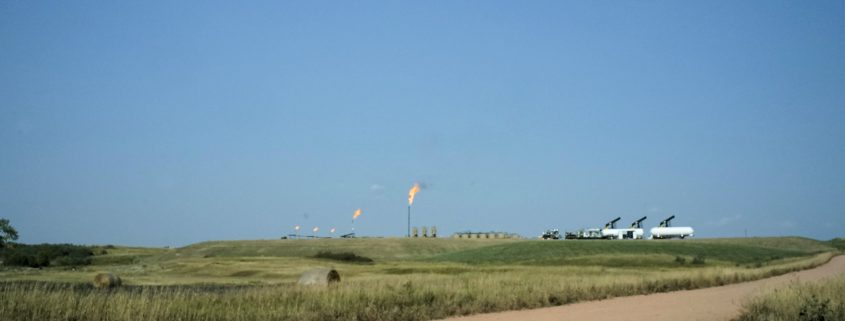 A multi-well pad with a natural gas collection tanks. Located near Keene, North Dakota. Photo by David Nix 2015.