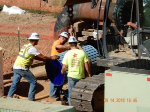 hughes-bill-workers-launching-pigs