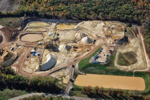 Western Wisconsin frac sand mine overburden, water impoundments, and processing infrastructure.