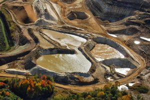 Western Wisconsin frac sand mine overburden and water impoundments.