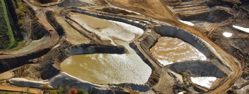 Western Wisconsin frac sand mine overburden and water impoundments.