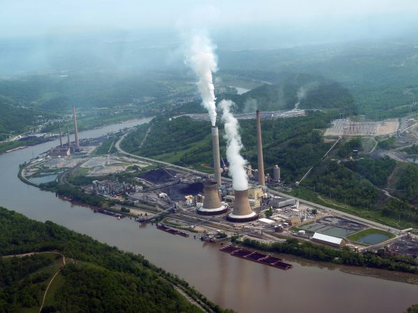 Figure 7: View of the Ohio River, downriver from the site of Shell’s proposed ethane cracker. Existing sources of industrial pollution to the river include the American Electric power plants, coal loading docks, barges, coal ash lagoons, and dry coal ash beds shown in this picture, and at least two fracking operations within the coal plant areas. Credit: Vivian Stockman/ohvec.org; flyover courtesy SouthWings.org.