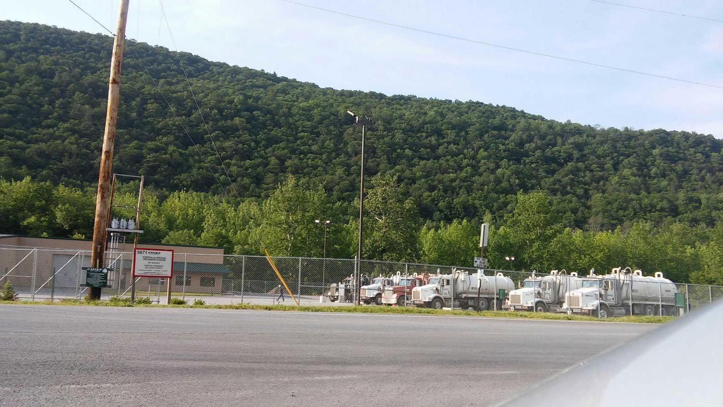 Trucks withdrawing water for drilling-related activities at the Forksville Heritage Freshwater Station, operated by Chief Oil & Gas. Photo from FracTracker mobile app report.