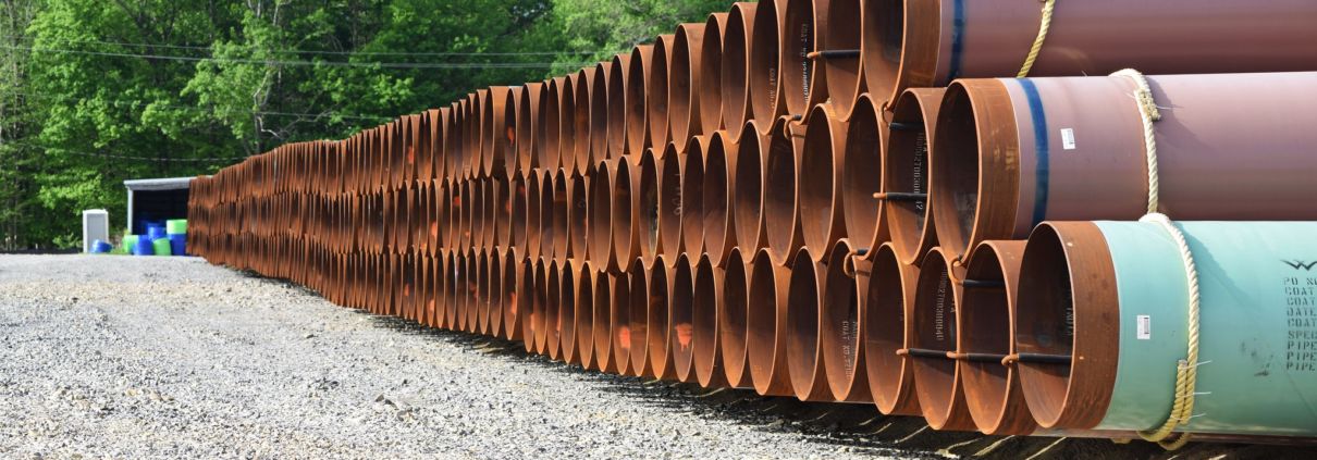 Stacked pipes used in constructing oil and gas pipelines