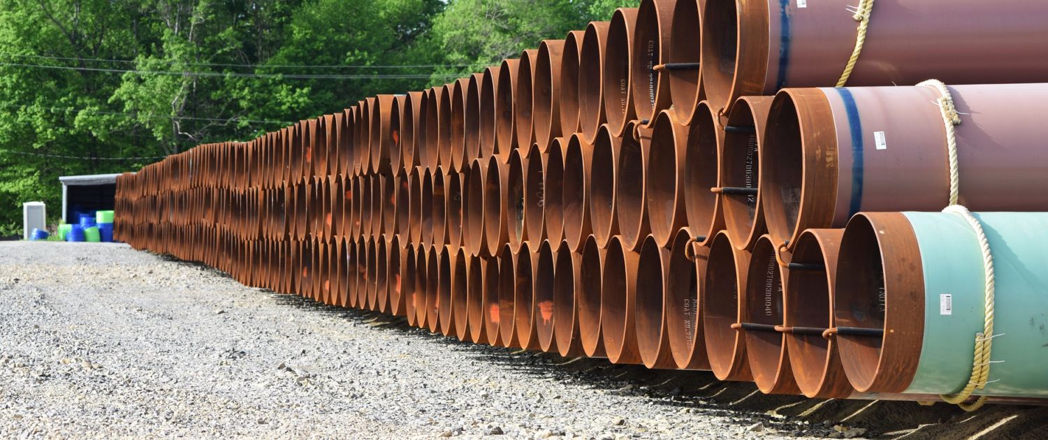 Stacked pipes used in constructing oil and gas pipelines