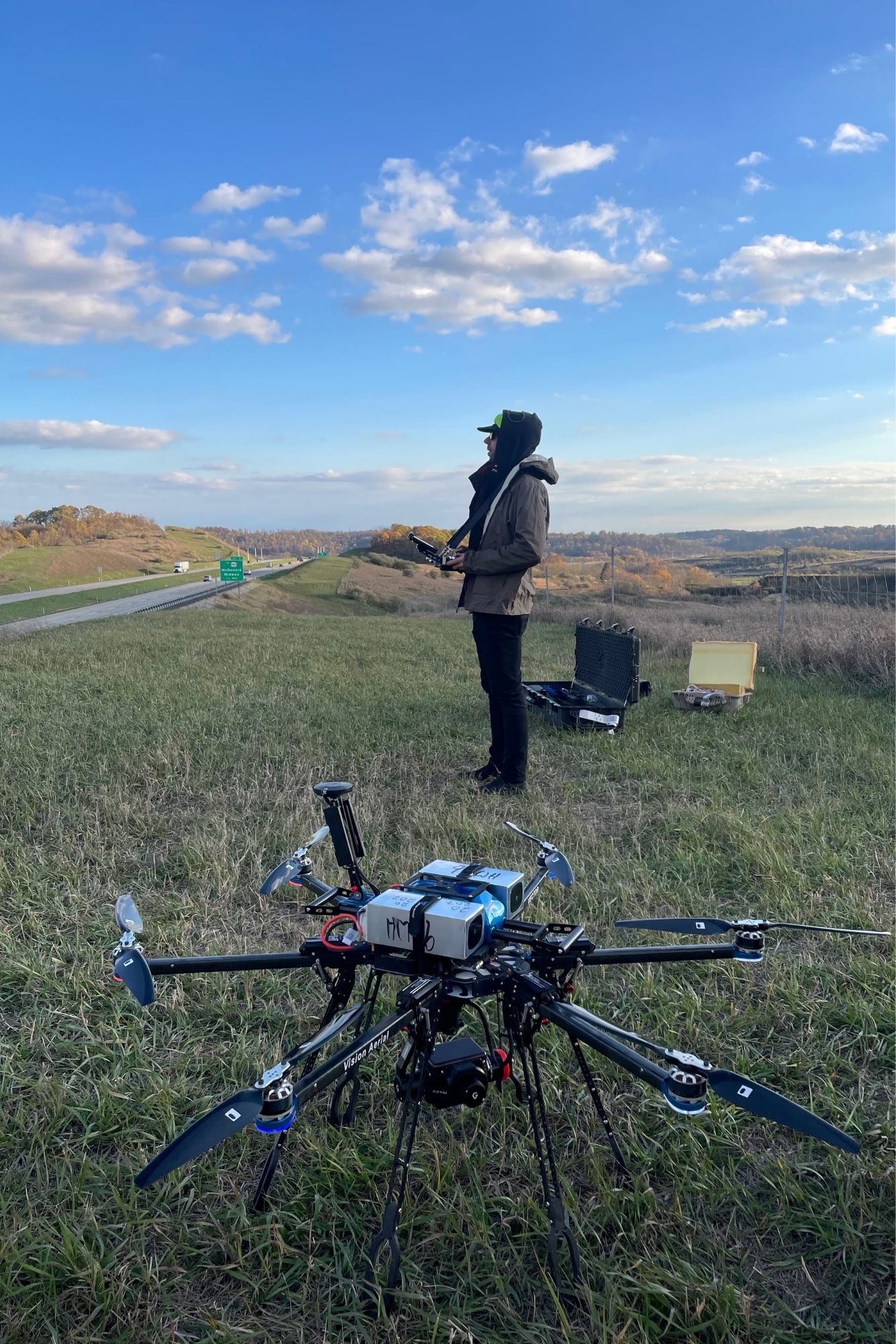 Kyle Ferrar operating a drone near the former Homer City Generating Station in Indiana County, Pennsylvania, while documenting construction activity at the proposed Homer City Energy Campus on April 1, 2026.